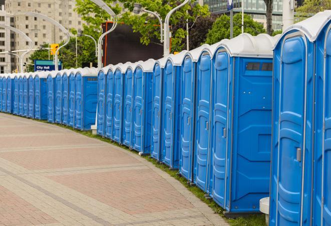 a row of portable restrooms at a fairground, offering visitors a clean and hassle-free experience in luther